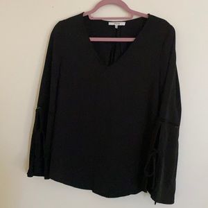 Adorable top with bell sleeves